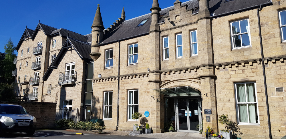 The outside of the house showing the entrance doors
