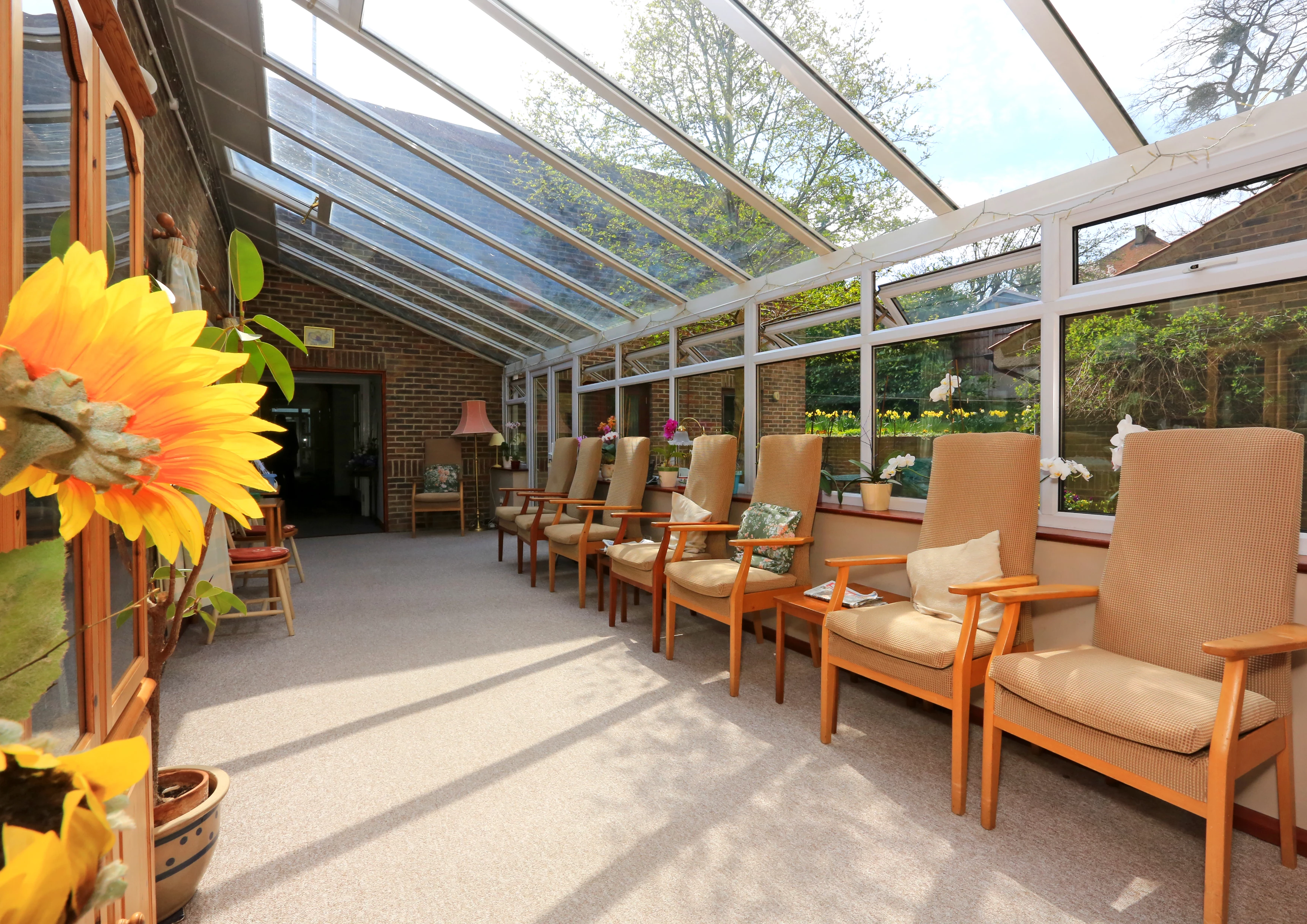 Large, Bright Conservatory Where Residents Can Relax, Socialise Or Enjoy The Views In The Garden At Warburton And Clarisse Lodge