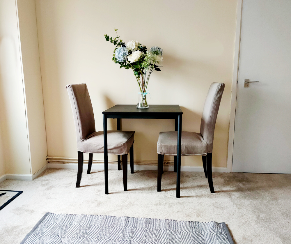 Dining area in spacious lounge area of resident flat at St Mary's House